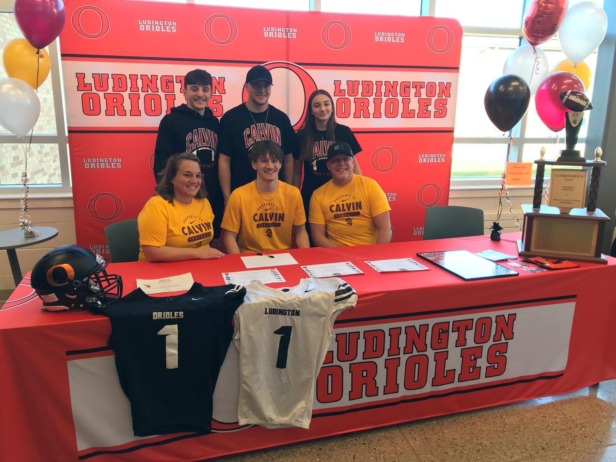Gage Jones signs with Calvin to Play Football - Content Image for ludingtonhighschool_bigteams_17681