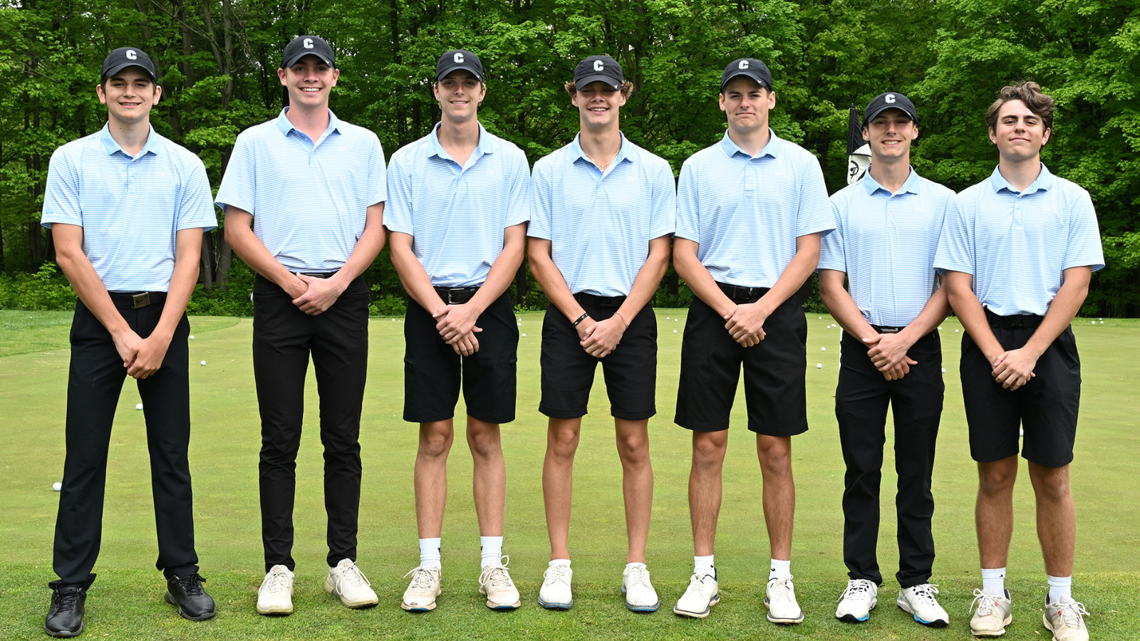7 Grand Rapids Christian High School boys golf seniors standing together.