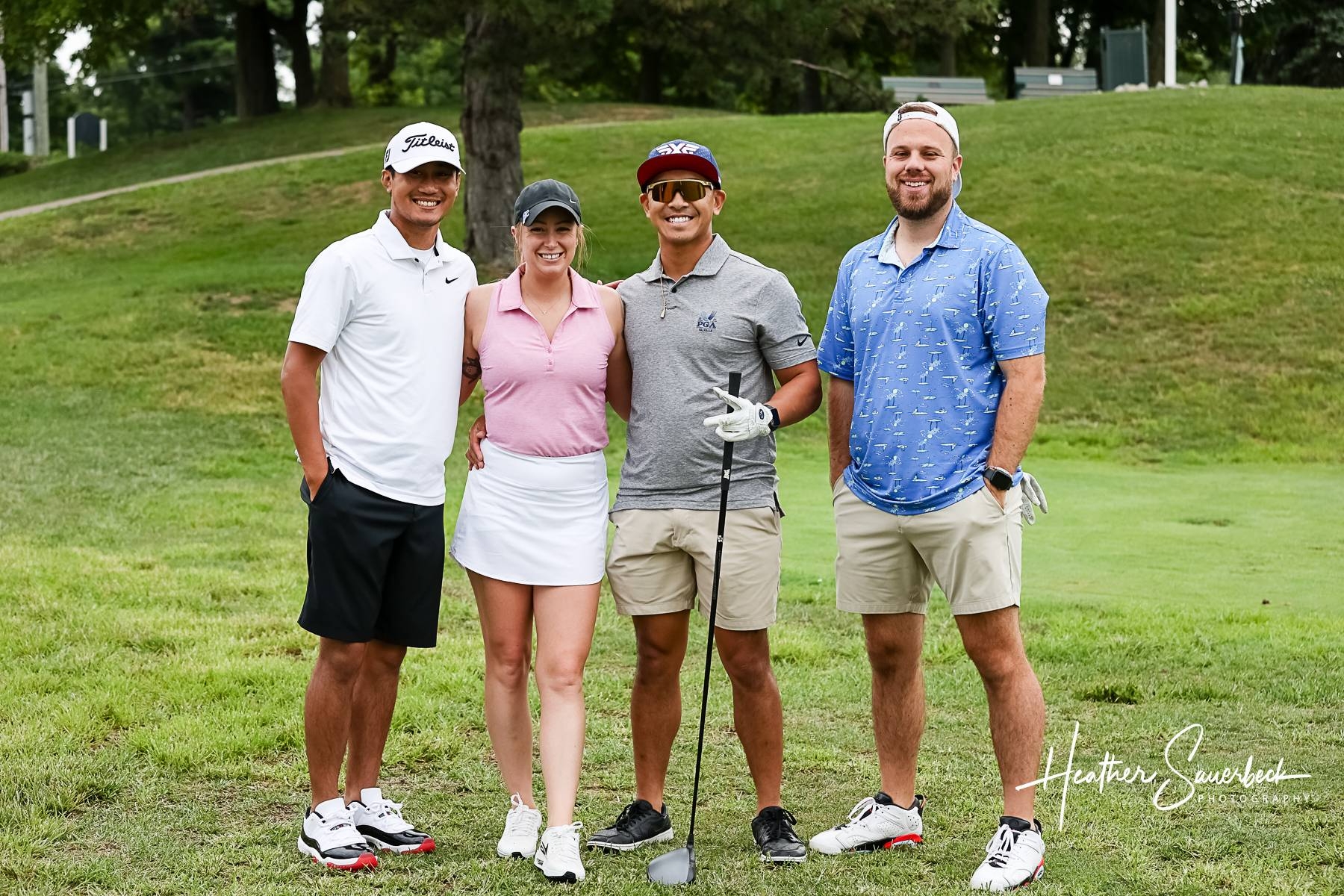 Heather Son and team claim top spot in NW Booster Golf Outing - Content Image for demo7363_bigteams_2474