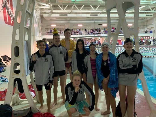 							
								The varsity swim team poses for a picture after their meet on 12/11/2022 at Wittenberg.					
							
						