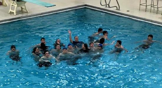 Ionia swimmers & coaches enjoy a celebratory swim!